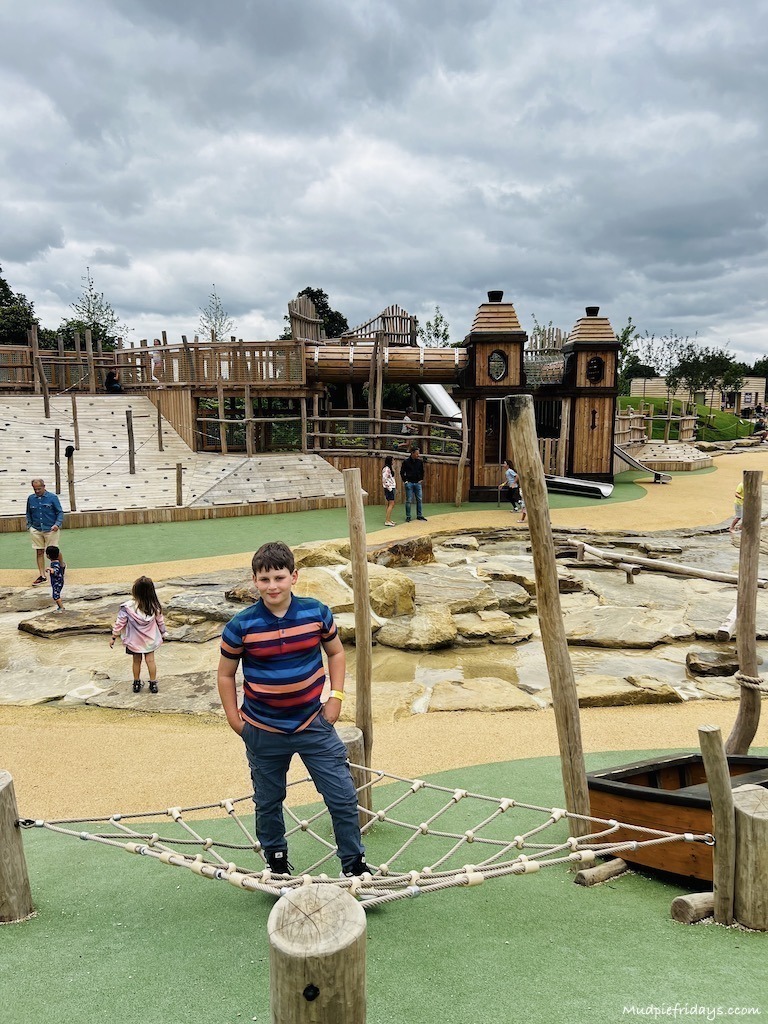 Charlie standing in the middle of the play area
