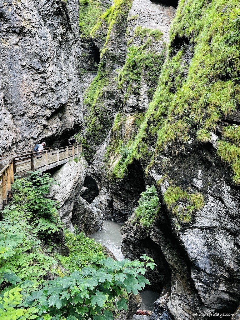 The view of liechtensteinklamm at the entrance with the winding walkway around the side of the rock