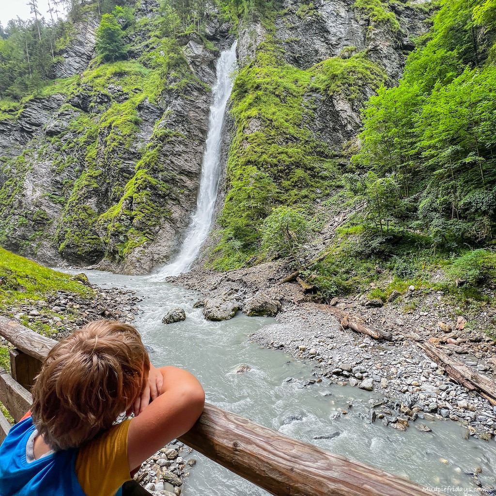 Harry in front of the large waterfall at Liechtenstein Gorge