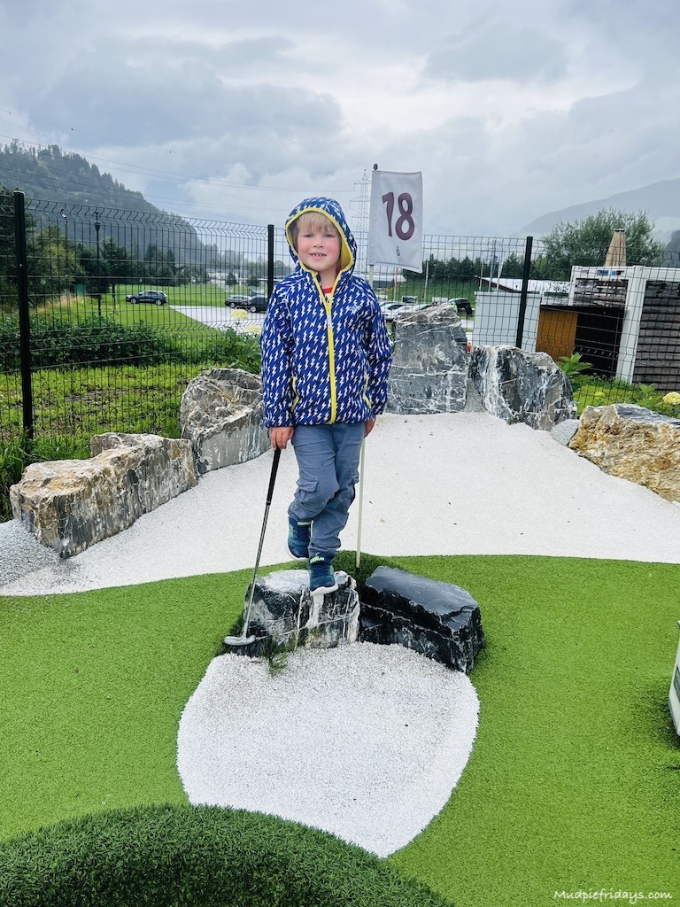 Harry waiting to play the 18th hole at JO adventure minigolf in St JOhann Salzburg