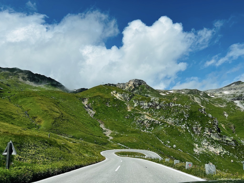 The high alpine road with one switch back showing