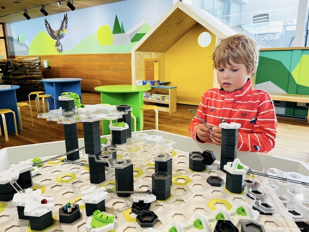 Harry trying out the gravitrax at the inside Ravensburger play area up the top of Ahorn, Mayrhofen, Zillertal Austria