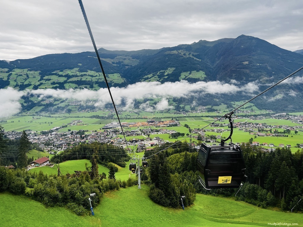 Going up in the Spieljochbahn with views of the valley below