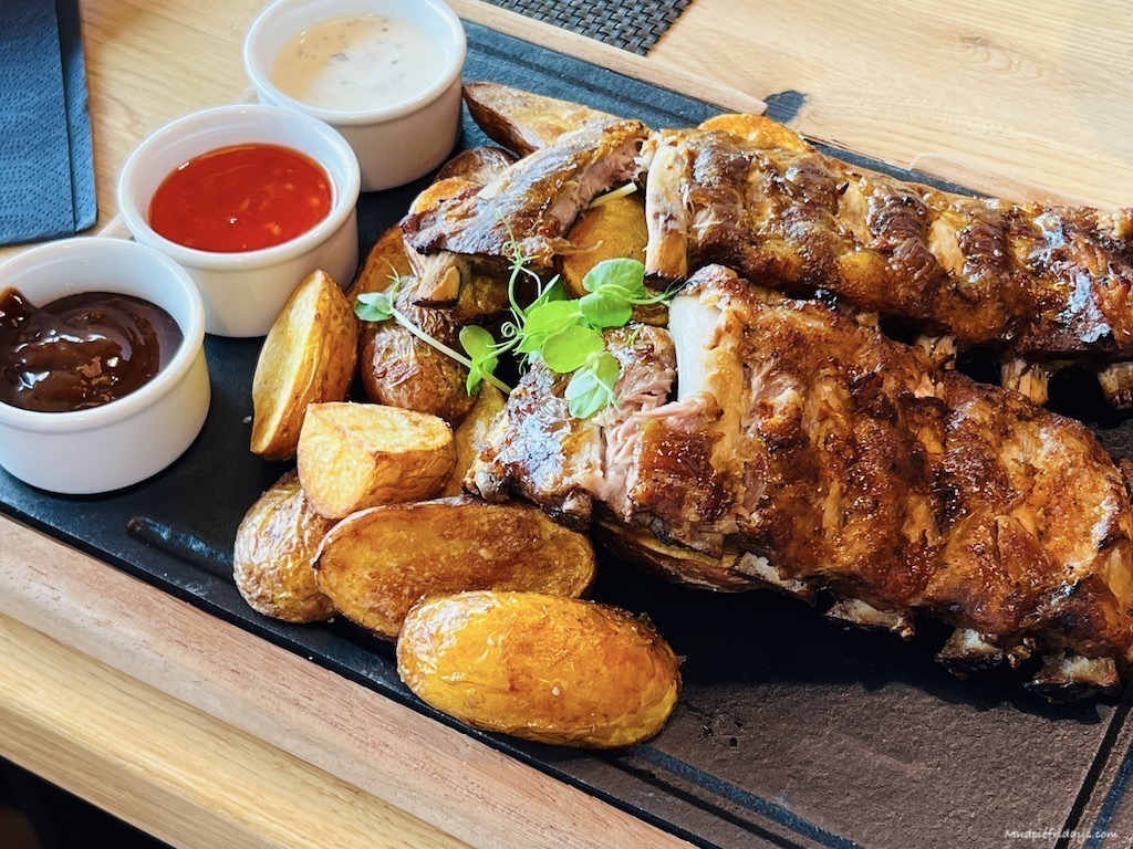 Charlies ribs with potatoes underneath - from the pizza and pasta restaurant at Mountain Loft