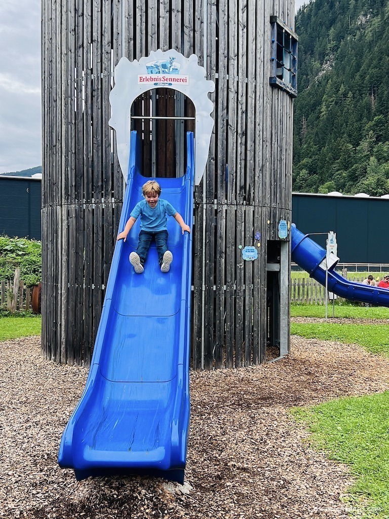 Harry going down one of the slides in the playarea at the cheese factory in Mayrhofen