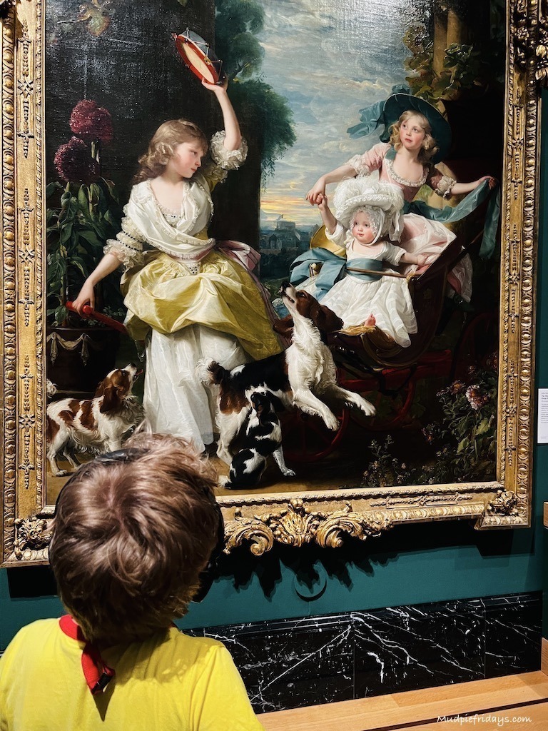 Harry in front of one of the works of art in the Queens Gallery - visiting Buckingham Palace with kids