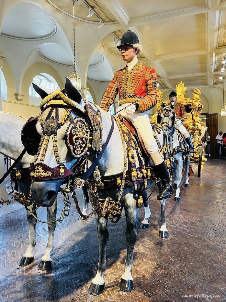 The Queen's coronation carriage in the Royal Mews at Buckingham Palace