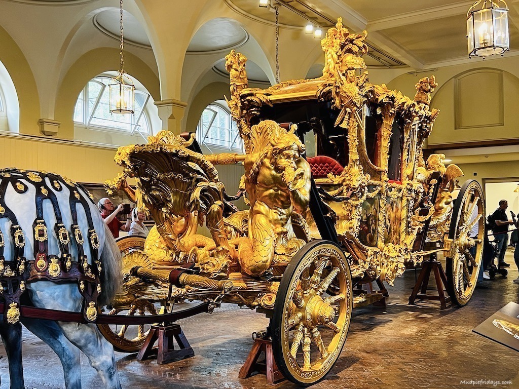 The Queen's coronation carriage in the Royal Mews at Buckingham Palace