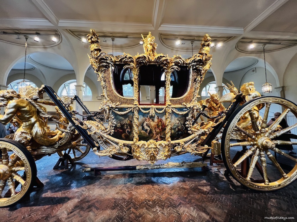 The Queen's coronation carriage in the Royal Mews at Buckingham Palace