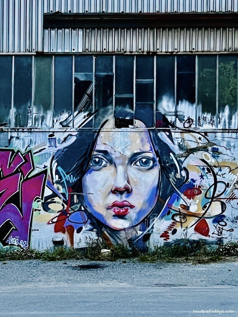 Some graffiti in Redon near to the harbour area. Shows a picture of a ladies face.