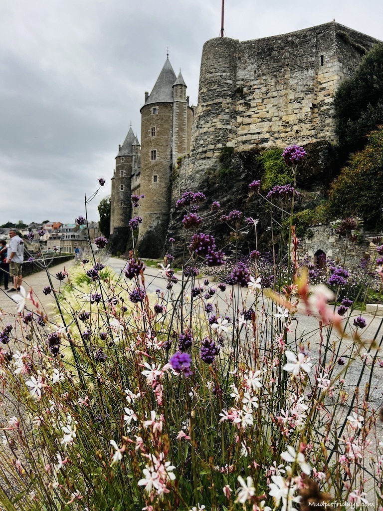 Josselin Chateau with flowers in front taken from the river