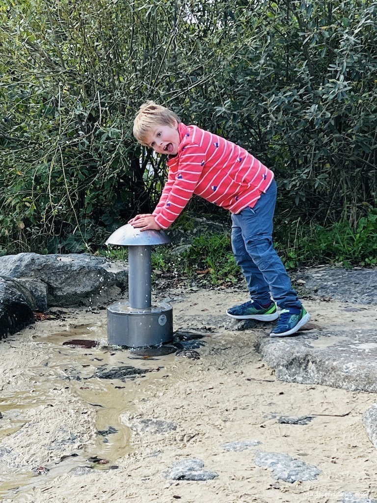 Harry playing in the water area