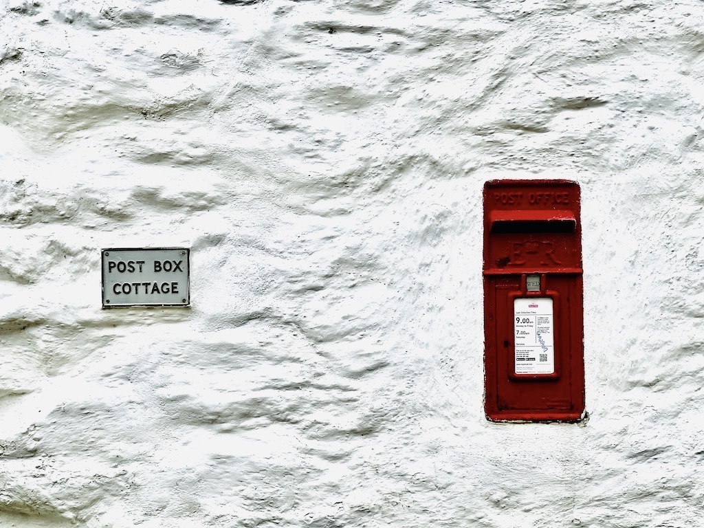 Postbox house in the village of Durgan in Cornwall
