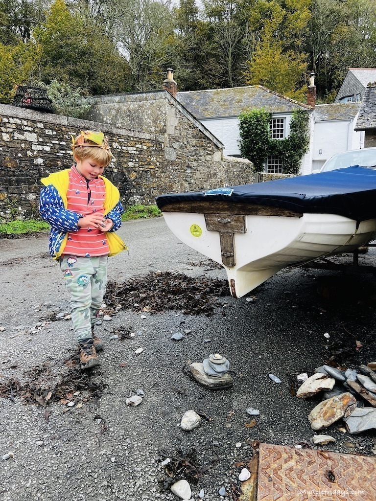 Harry building rock towers in the village of Durgan in Cornwall