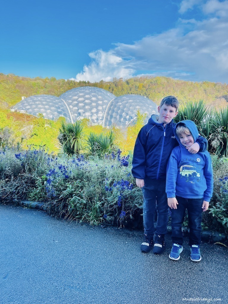 The boys standing in front of the domes at the Eden Project