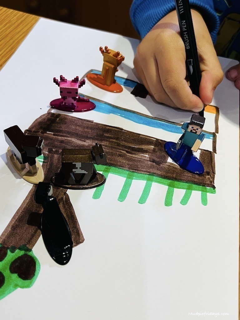 Harry drawing and used his playset to act out some stories