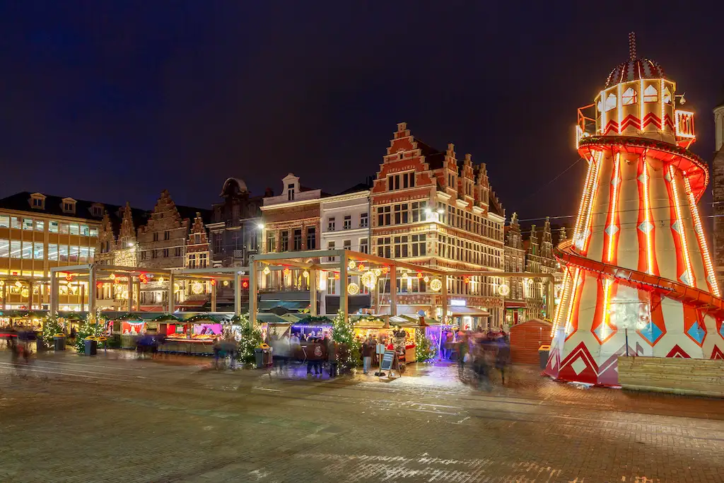 Helter skelter and christmas market stalls in Ghent