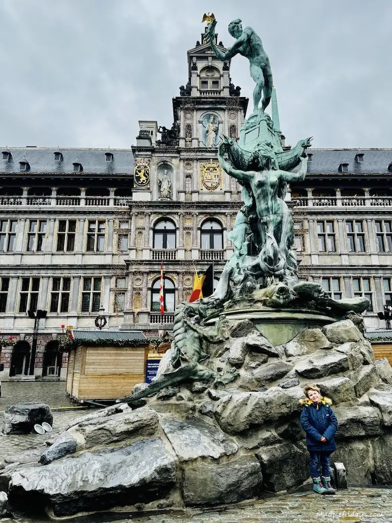 Harry standing in front of the fountain in front of city hall