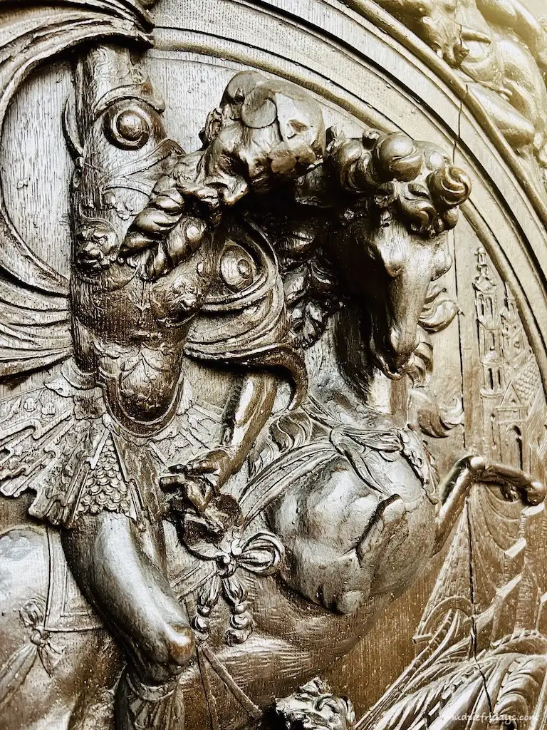 George and the dragon carving which features on one of the doors celebrates the marriage of Henry VIII and Anne Boleyn.
