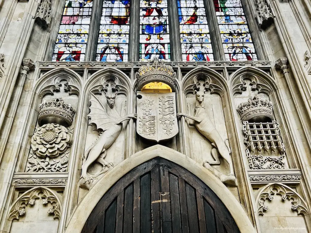 Stone carvings above the door. below the great east window