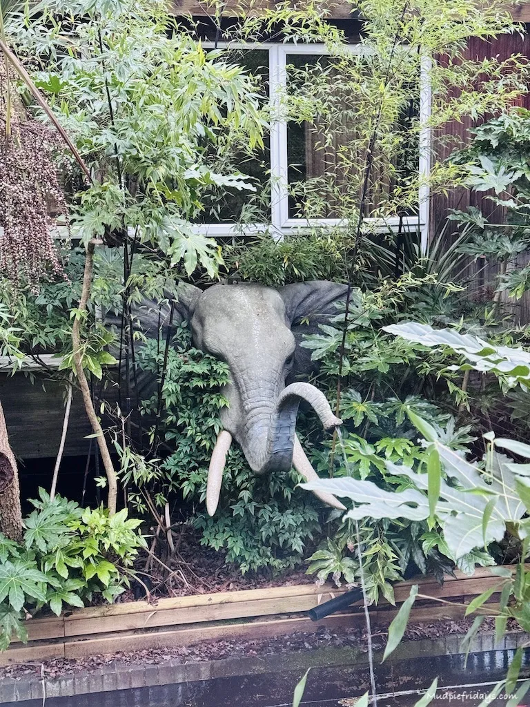 An elephant water feature in a pond by the entrance