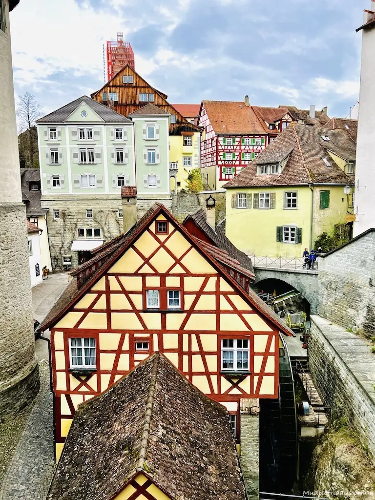Half-timbered houses and water wheel located near to Meersburg old castle
