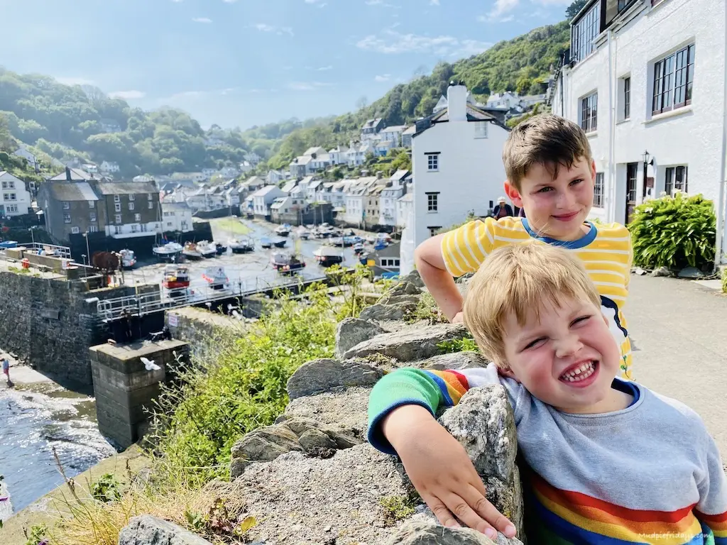 The boys with the harbour in the background