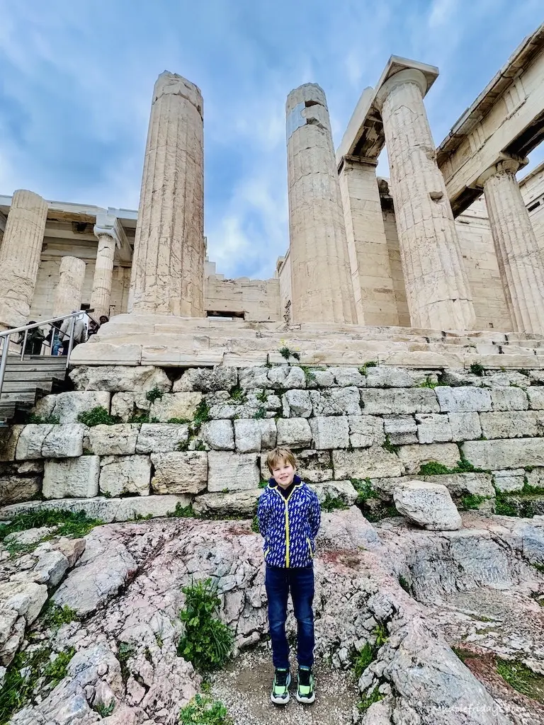 Harry standing in front of the columns on the Parthenon.