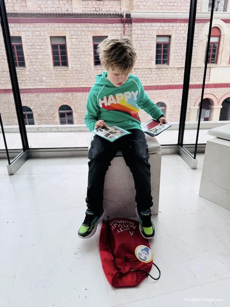 Harry exploring the contents of the discovery activity pack
