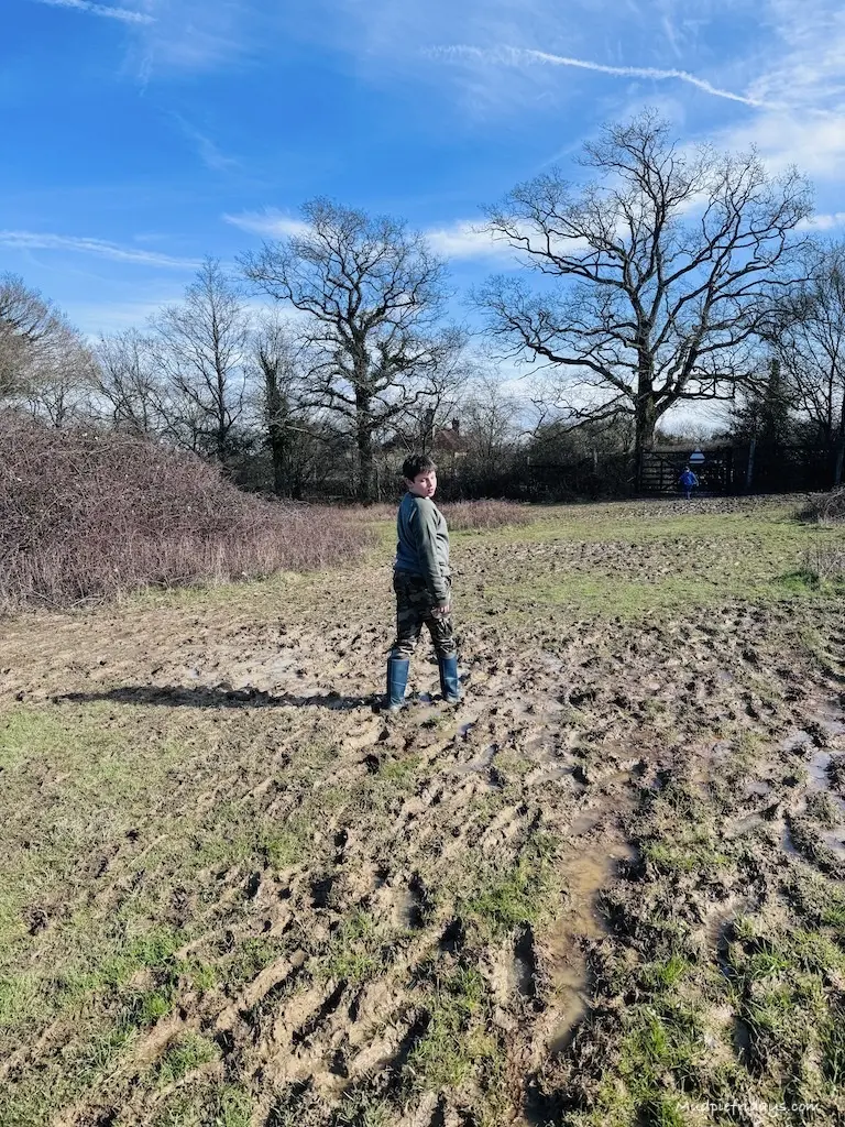 Charlie walking through the deep mud