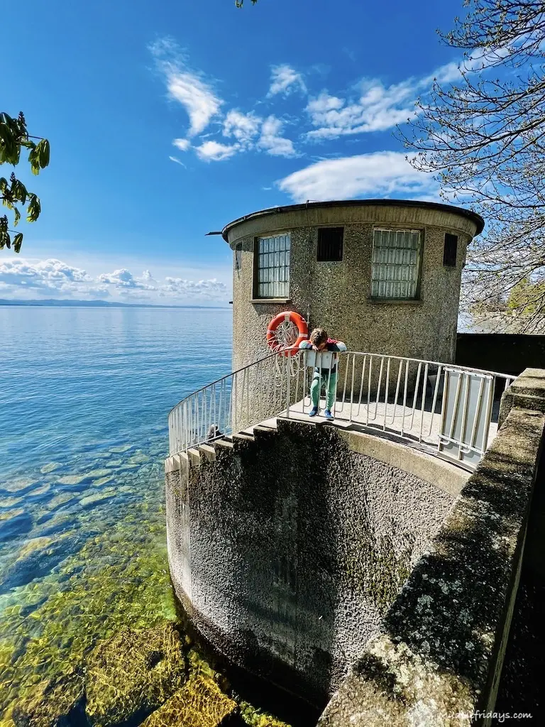One of the look out towers along the side of Lindua in Germany with Harry looking into the clear water