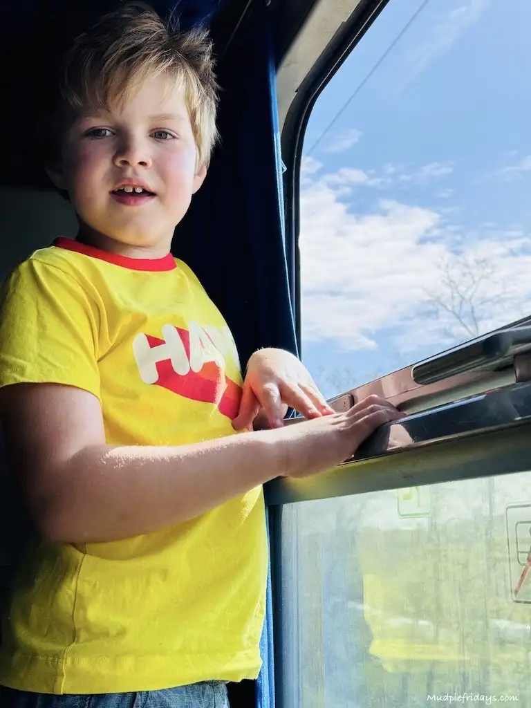 Harry looking out the window on the european sleeper in the morning