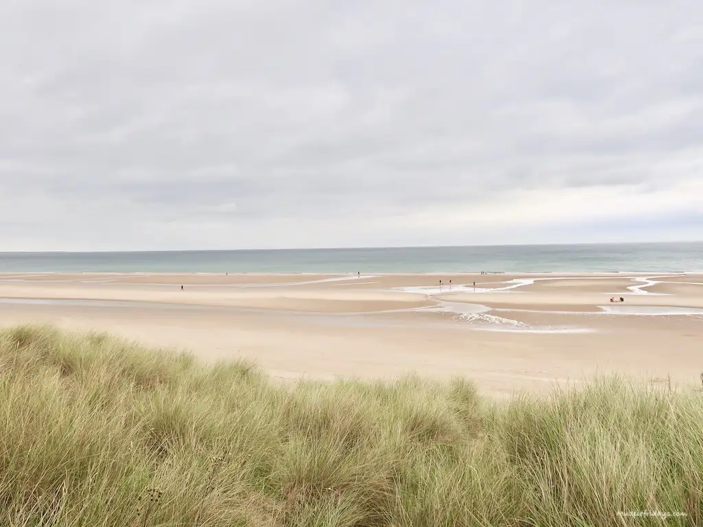 Bambrugh beach across the sand dunes.