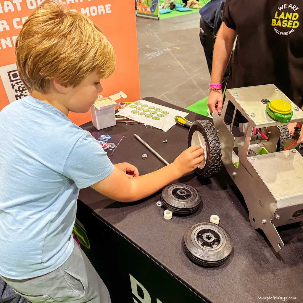 Harry building a tractor at the New Scientist Live event