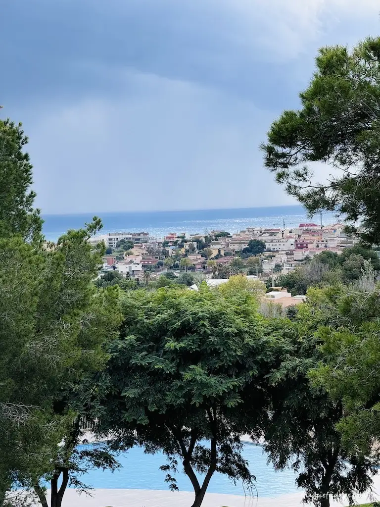Vilanova Park Review - the view from the mini golf on the campsite across to the town of Vilanova with the swimming pool in the foreground