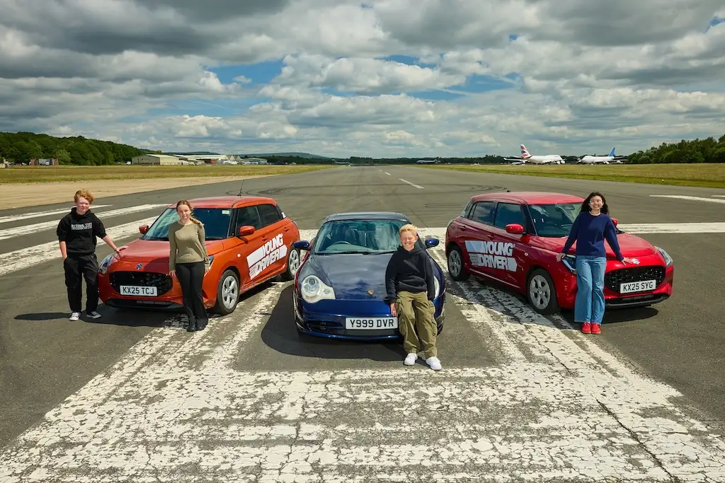 Young Drivers with Suzuki Swifts Porsche 911 on track at Dunsfold